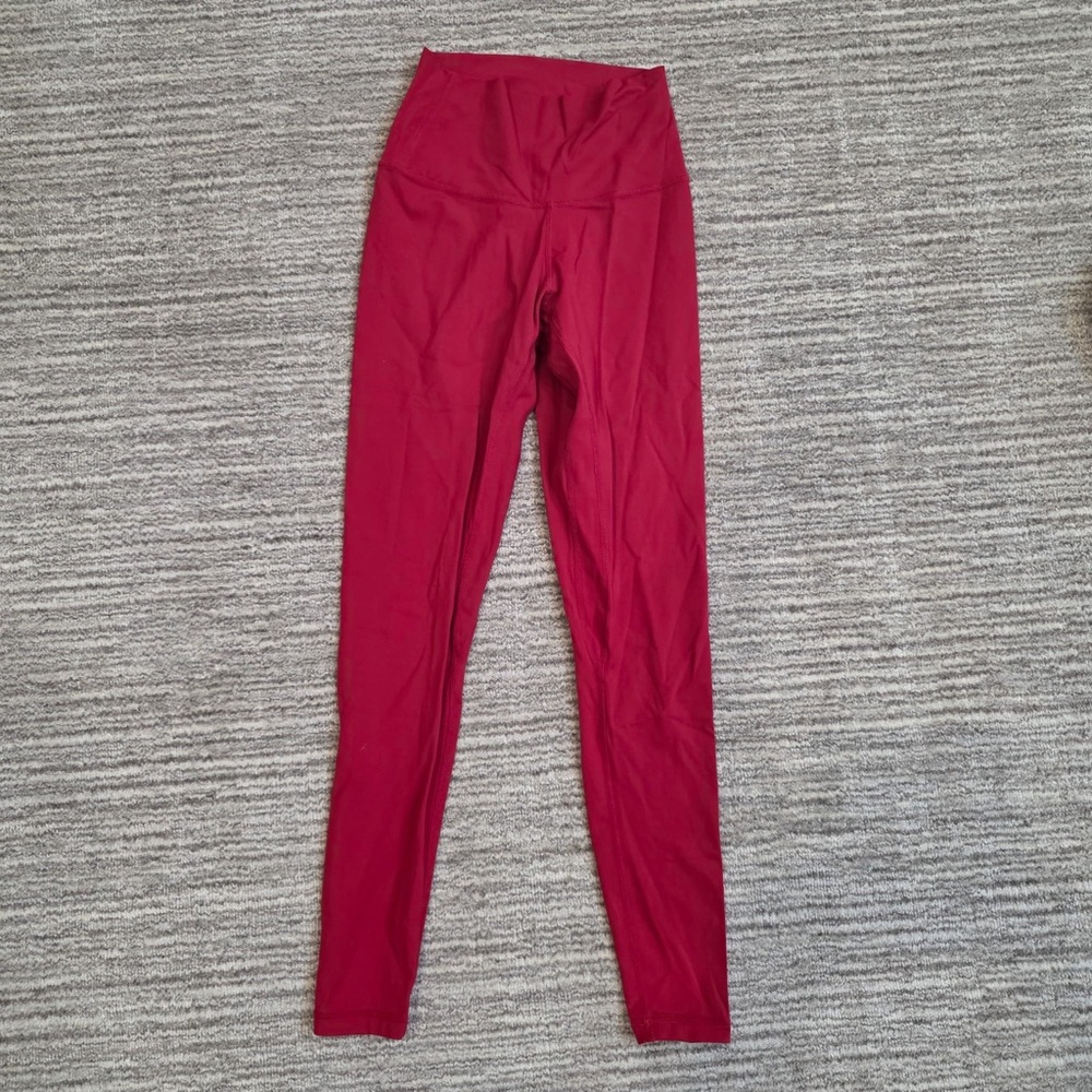 Red leggings, women’s size small